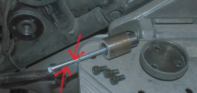 left side swingarm shaft parts.jpg